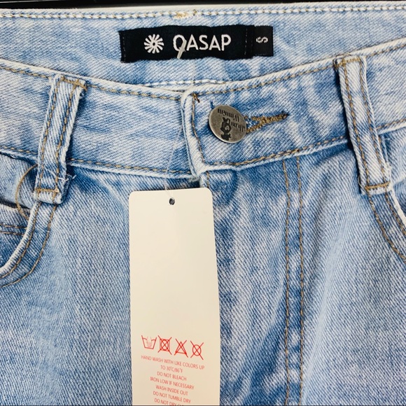 Light wash distressed boyfriend fit jean… - Picture 2 of 7